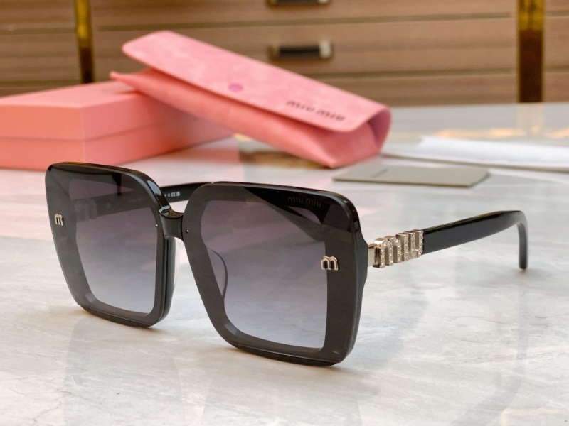 Miu miu Sunglasses